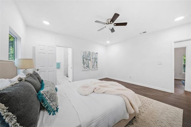 bedroom featuring recessed lighting, visible vents, baseboards, and wood finished floors