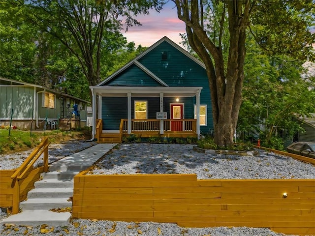 view of front of property featuring covered porch