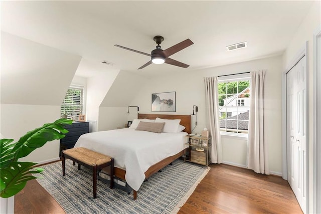 999 Seaboard Ave NW, Atlanta, GA 30318 - bedroom featuring multiple windows, wood finished floors, and a ceiling fan