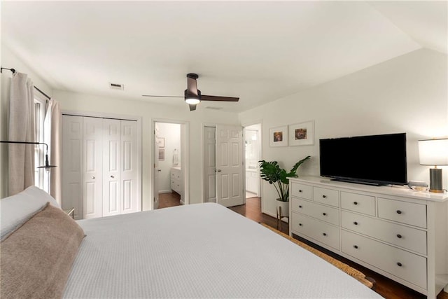 999 Seaboard Ave NW, Atlanta, GA 30318 - bedroom with dark wood-style floors, ensuite bath, and a ceiling fan