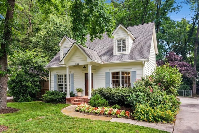 999 Seaboard Ave NW, Atlanta, GA 30318 - cape cod-style house featuring a shingled roof
