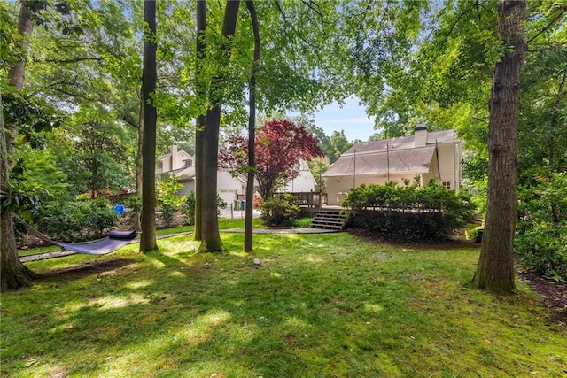 999 Seaboard Ave NW, Atlanta, GA 30318 - view of grassy yard with a wooden deck