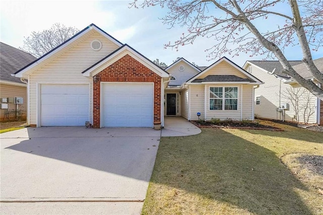 ranch-style home featuring concrete driveway, a garage, brick siding, and a front lawn