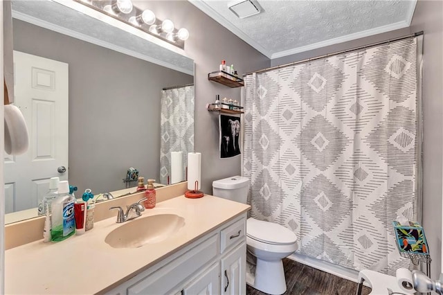 bathroom with wood finished floors, toilet, ornamental molding, and vanity