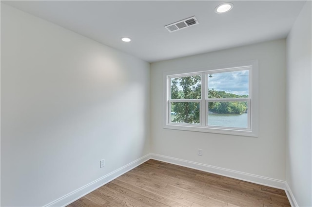 empty room featuring hardwood / wood-style floors