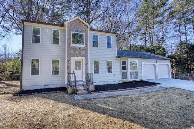 colonial home with a garage