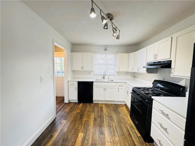 kitchen with white cabinetry, sink, ceiling fan, black appliances, and dark wood-type flooring