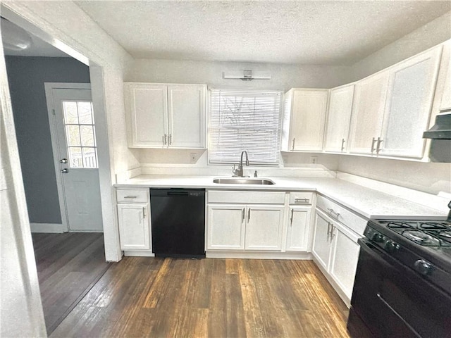 kitchen with sink, white cabinets, and black appliances