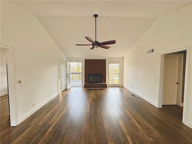 unfurnished living room featuring dark wood-type flooring, a fireplace, high vaulted ceiling, and ceiling fan