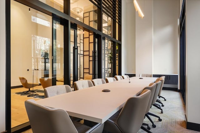2425 Peachtree Rd NE Unit 903, Atlanta, GA 30305 - office space with a towering ceiling, healthy amount of natural light, and wood finished floors