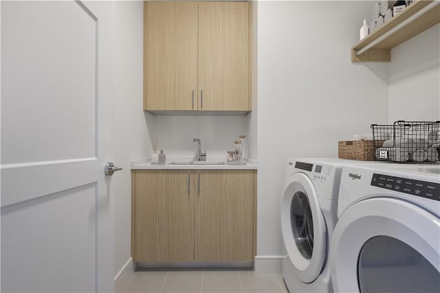 2425 Peachtree Rd NE Unit 903, Atlanta, GA 30305 - washroom featuring independent washer and dryer, light tile patterned floors, wet bar, and cabinet space