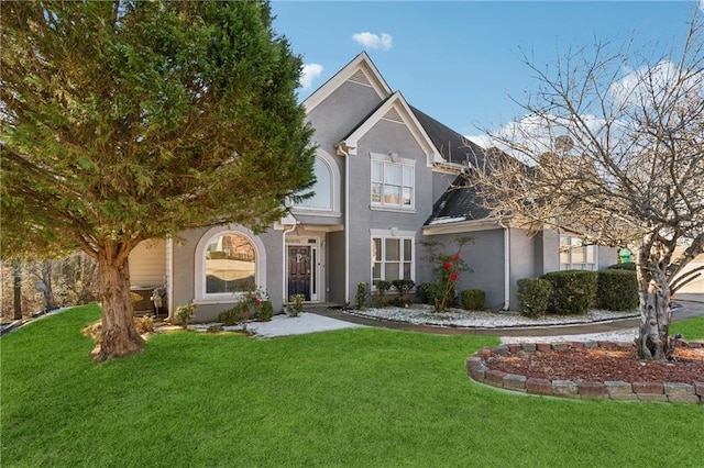 4497 Black Water Cv, Ellenwood, GA 30294 - traditional home featuring stucco siding and a front yard
