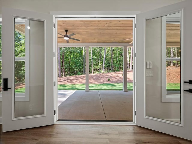 2335 Azalea Dr, Loganville, GA 30052 - doorway to outside featuring plenty of natural light, a ceiling fan, and wood finished floors