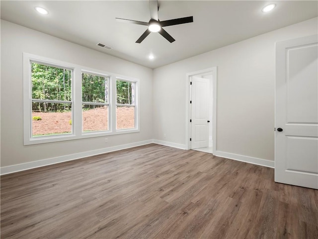 2335 Azalea Dr, Loganville, GA 30052 - unfurnished room featuring wood finished floors, a ceiling fan, and recessed lighting