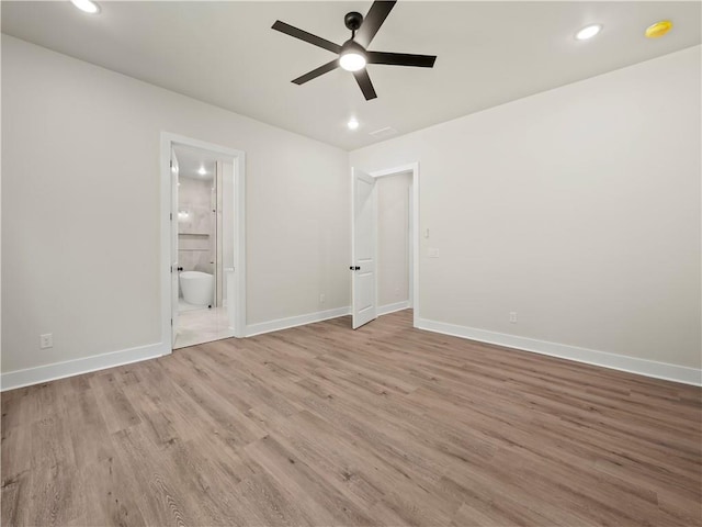 2335 Azalea Dr, Loganville, GA 30052 - unfurnished bedroom with wood finished floors, recessed lighting, ensuite bathroom, and a ceiling fan
