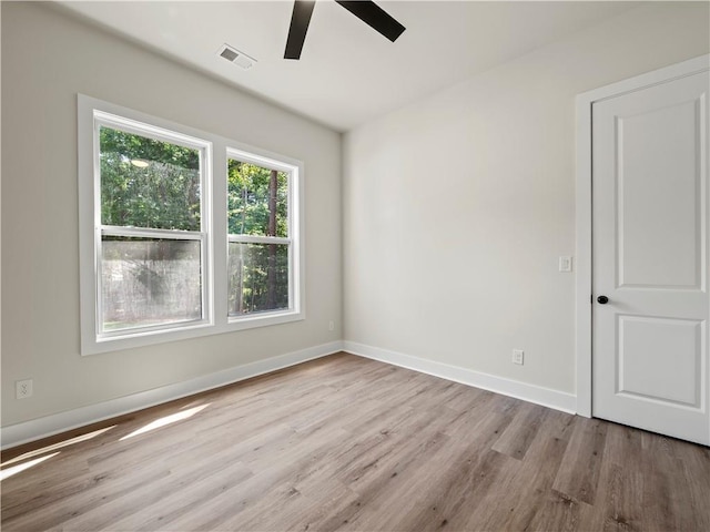 2335 Azalea Dr, Loganville, GA 30052 - empty room with a ceiling fan and wood finished floors