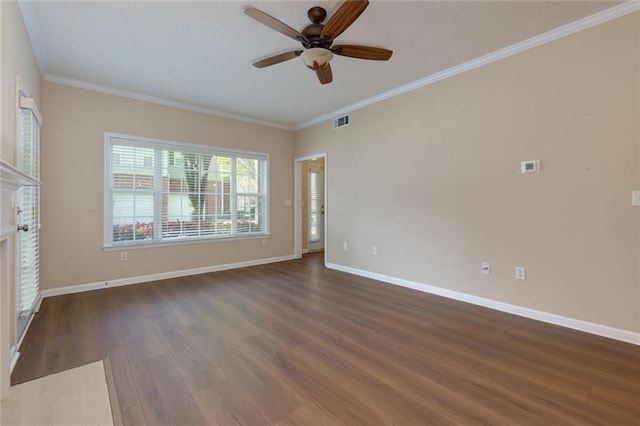 8020 Woodland Ln, Alpharetta, GA 30009 - spare room with a ceiling fan, crown molding, wood finished floors, and baseboards