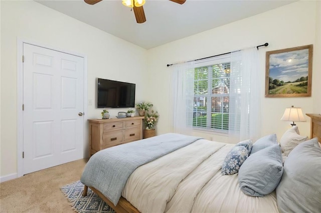 8020 Woodland Ln, Alpharetta, GA 30009 - bedroom with carpet floors and a ceiling fan