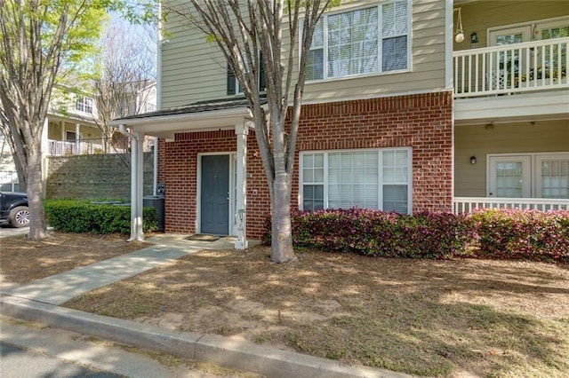 8020 Woodland Ln, Alpharetta, GA 30009 - entrance to property featuring brick siding
