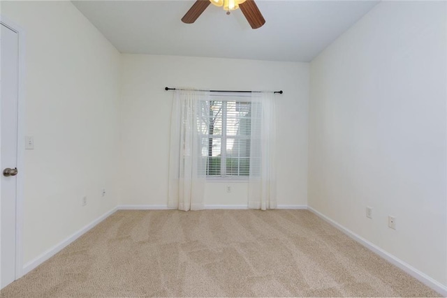 8020 Woodland Ln, Alpharetta, GA 30009 - carpeted empty room with a ceiling fan and baseboards