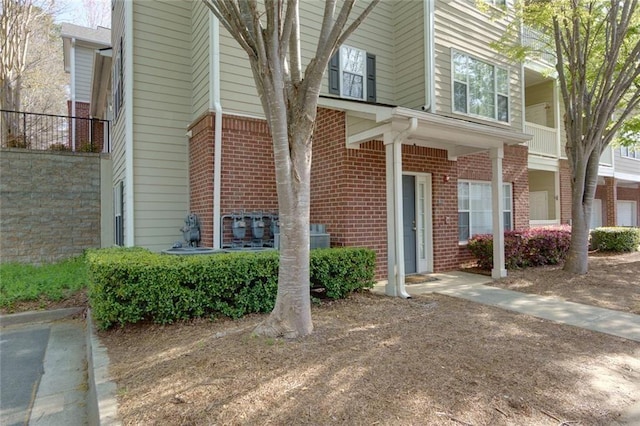 8020 Woodland Ln, Alpharetta, GA 30009 - view of front of property featuring brick siding