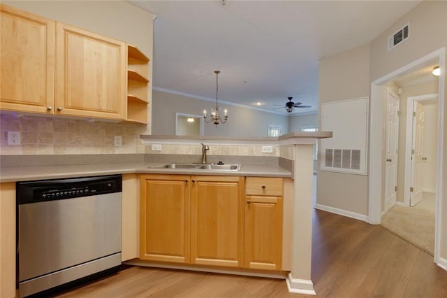 8020 Woodland Ln, Alpharetta, GA 30009 - kitchen featuring stainless steel dishwasher, a sink, a peninsula, and light wood-type flooring