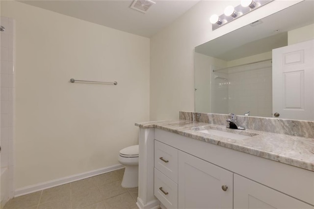 8020 Woodland Ln, Alpharetta, GA 30009 - bathroom with toilet, vanity, tile patterned flooring, and baseboards