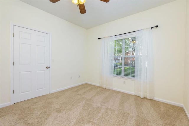 8020 Woodland Ln, Alpharetta, GA 30009 - carpeted empty room with ceiling fan and baseboards