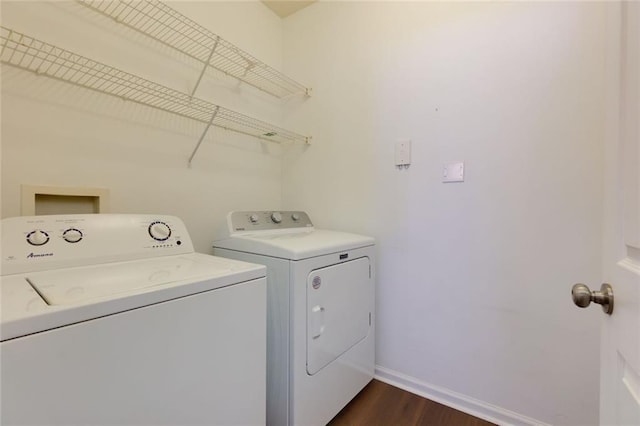8020 Woodland Ln, Alpharetta, GA 30009 - laundry area featuring washer and dryer, baseboards, and dark wood-style flooring