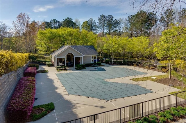 8020 Woodland Ln, Alpharetta, GA 30009 - view of swimming pool featuring a patio area, a storage structure, and an outdoor structure