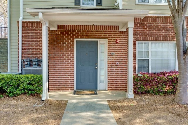 8020 Woodland Ln, Alpharetta, GA 30009 - doorway to property featuring brick siding