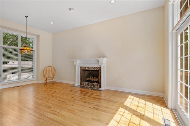 267 Starcross Ln, Jasper, GA 30143 - unfurnished living room with wood finished floors, baseboards, recessed lighting, and a fireplace