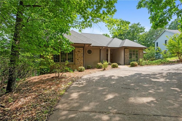 267 Starcross Ln, Jasper, GA 30143 - view of front of house featuring stone siding and roof with shingles