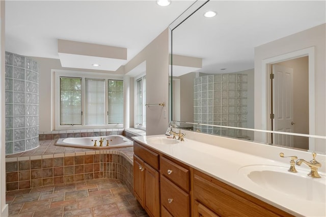 267 Starcross Ln, Jasper, GA 30143 - full bathroom featuring a bath, double vanity, stone finish flooring, and recessed lighting