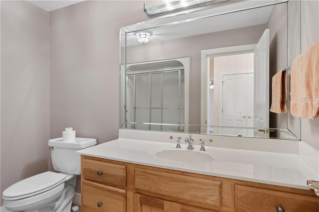 267 Starcross Ln, Jasper, GA 30143 - bathroom featuring vanity, toilet, and a shower with door