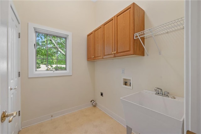 267 Starcross Ln, Jasper, GA 30143 - laundry room featuring cabinet space, washer hookup, electric dryer hookup, baseboards, and light floors