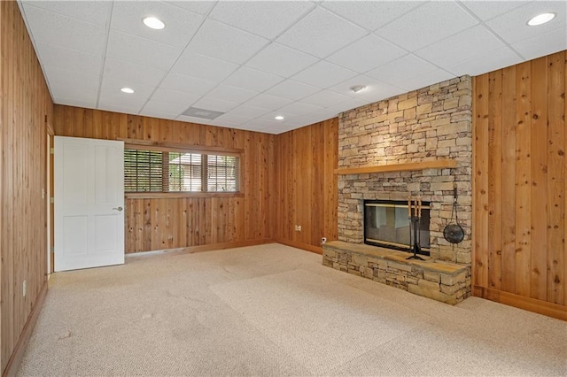 267 Starcross Ln, Jasper, GA 30143 - unfurnished living room with baseboards, wood walls, a fireplace, carpet floors, and recessed lighting
