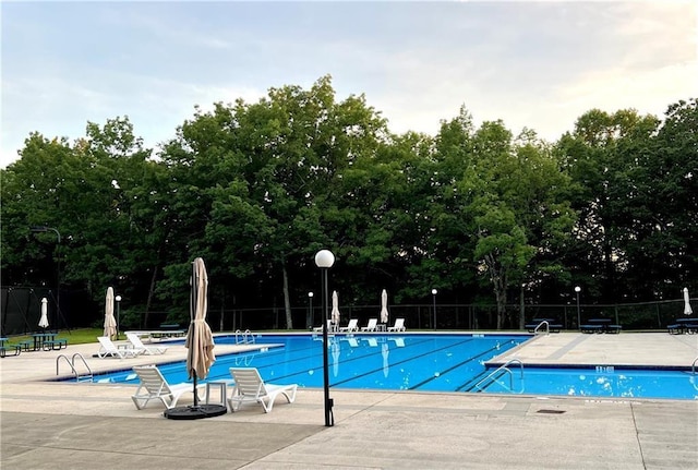 267 Starcross Ln, Jasper, GA 30143 - community pool with a patio area and view of scattered trees