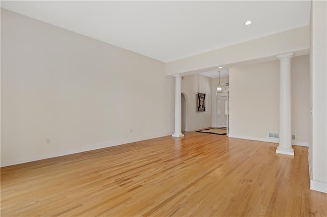267 Starcross Ln, Jasper, GA 30143 - empty room with light wood-type flooring, baseboards, recessed lighting, and arched walkways