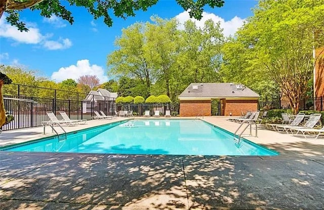 view of pool featuring a patio area