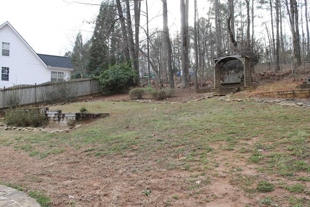 view of yard with fence