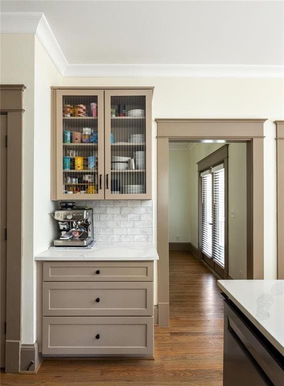 2876 White Oak Dr, Decatur, GA 30032 - indoor dry bar featuring ornamental molding, dark wood finished floors, backsplash, and baseboards