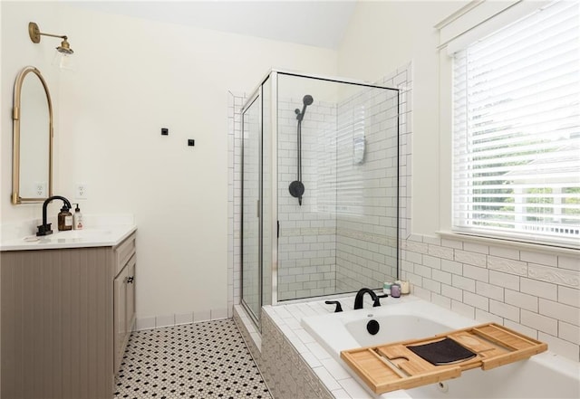 2876 White Oak Dr, Decatur, GA 30032 - full bath with a garden tub, a shower stall, vanity, and tile patterned floors