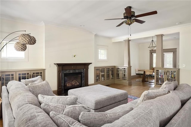 2876 White Oak Dr, Decatur, GA 30032 - living room with wood finished floors, crown molding, a ceiling fan, and a fireplace