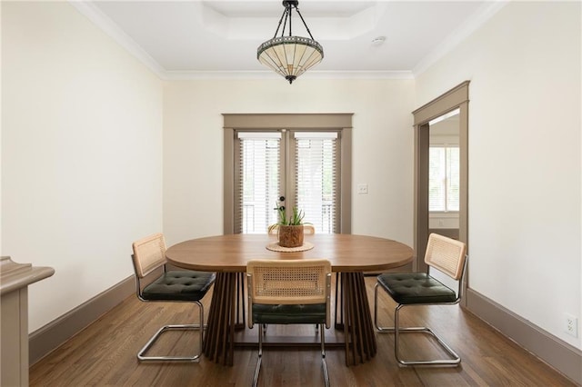 2876 White Oak Dr, Decatur, GA 30032 - dining area with wood finished floors, healthy amount of natural light, a tray ceiling, baseboards, and ornamental molding