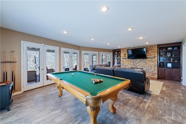 recreation room with french doors, wood finished floors, and billiards