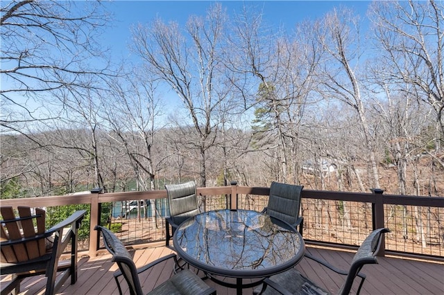 wooden deck with outdoor dining area