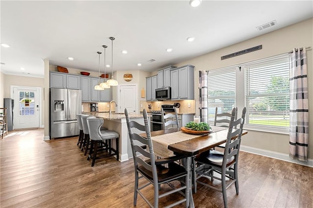 3735 Westhaven Dr, Cumming, GA 30040 - dining space featuring wood finished floors and recessed lighting
