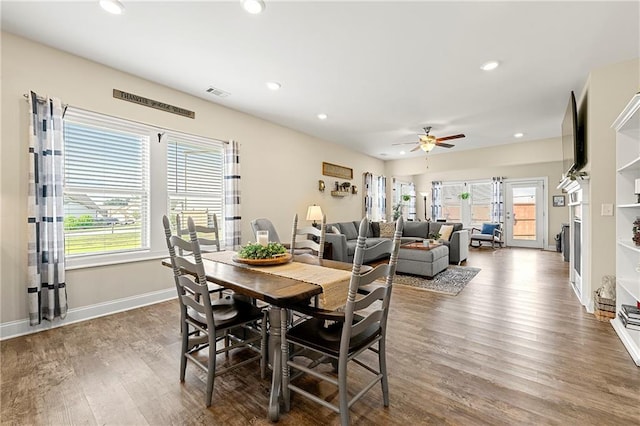 3735 Westhaven Dr, Cumming, GA 30040 - dining room with healthy amount of natural light, wood finished floors, recessed lighting, and a ceiling fan