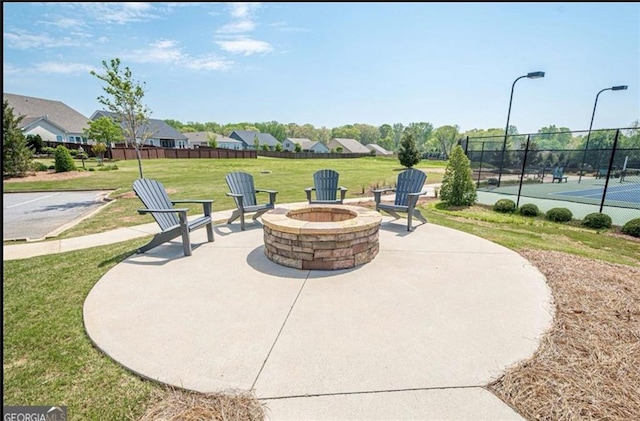 3735 Westhaven Dr, Cumming, GA 30040 - view of patio with a fire pit and a tennis court
